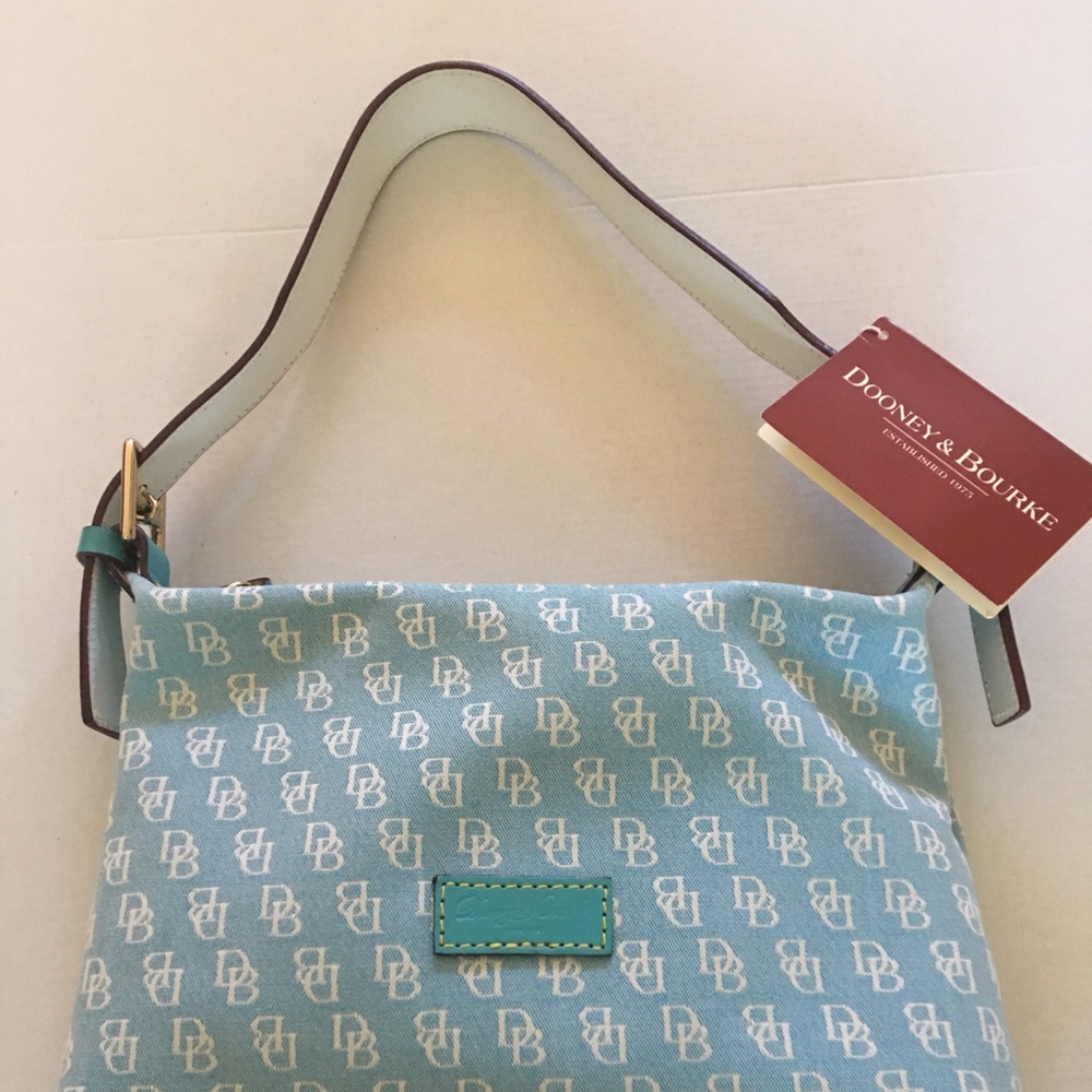 Rooney and Burke authentic purse in new condition